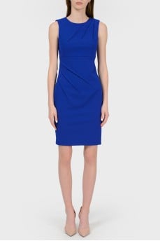 Laconic dress with a drapery and a tag