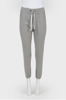 Trousers with elastic and drawstring