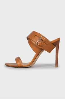 Leather sandals with a massive strap