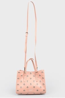 Powder bag with eyelets