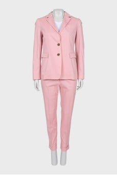 Trouser suit with accent buttons