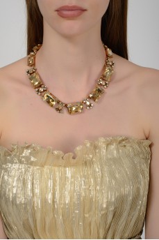 Golden necklace with square stones with tag