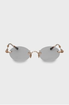 Gold colored glasses frame