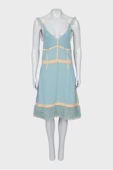 Dress with thin straps and frills