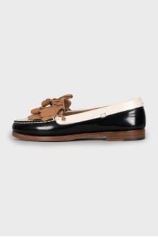 Black and white leather loafers