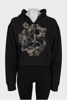 Hoodie decorated with beads and sequins