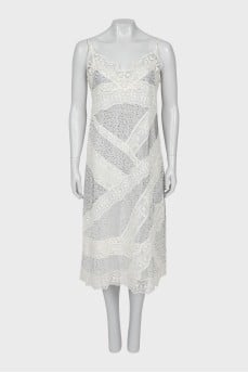 Dress decorated with embroidery and rhinestones
