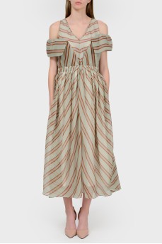 Dress in a diagonal strip with open shoulders with a tag