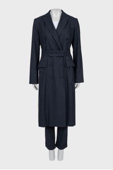 Suit of a long jacket and trousers