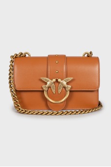 Leather bag with metal chain
