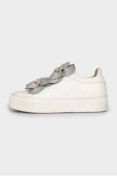 Leather sneakers decorated with rhinestones