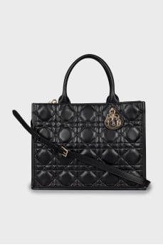 Leather bag with branded keychain