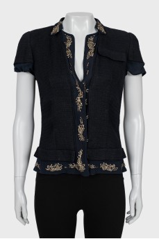 Blouse with hook and eye fastening