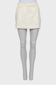 Denim skirt with raw hem