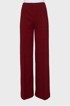 Red straight-leg trousers with creases