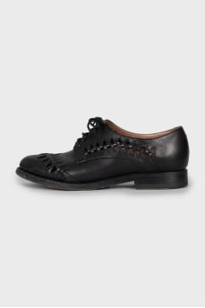 Leather brogues with shaped cutouts