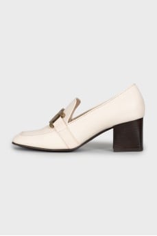 White leather shoes with medium heels