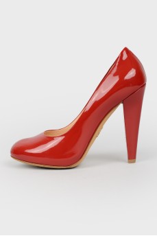 Red patent leather shoes with stiletto heels