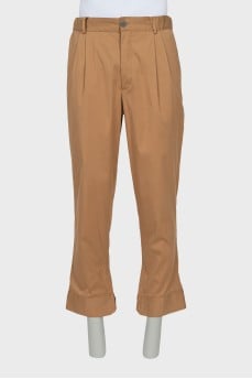Men's trousers with buttons at the bottom