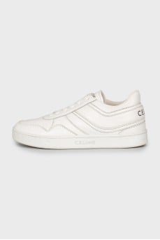 White leather sneakers with logo