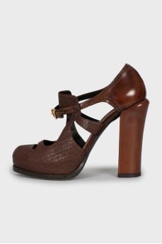 Brown leather shoes with perforation