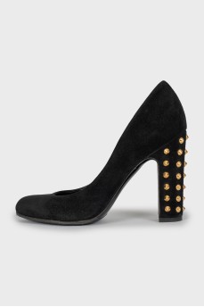 Suede shoes decorated with spikes