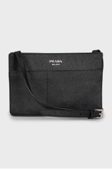 Leather bag with button