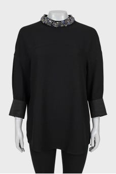 Dress with decorated collar