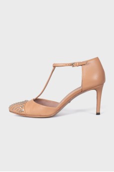 Beige shoes with metallic decor