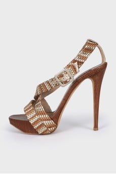 Brown leather and wood sandals