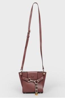 Burgundy bag on protective legs