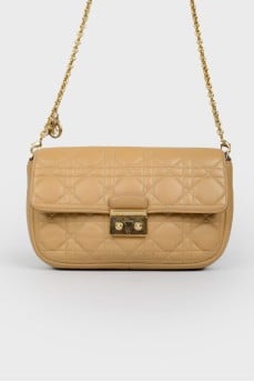 Leather quilted bag with belt-chain