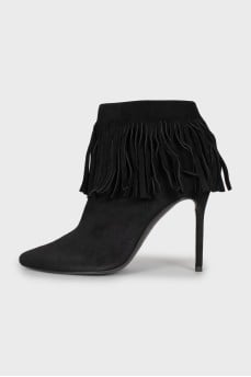 Black suede ankle boots with fringe