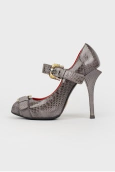 Shoes under the skin of a reptile