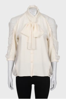 Loose fit blouse with tie