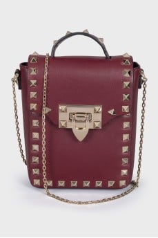 Red bag with metal decor