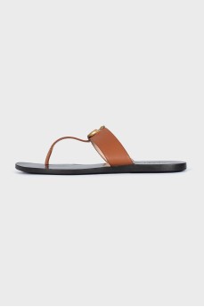 Brown flip flops with logo