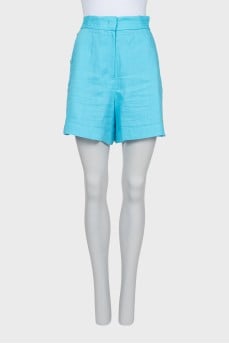 Blue shorts with gold buttons