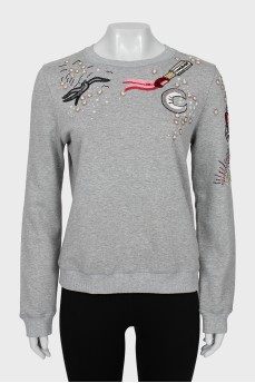 Grey sweatshirt with sequins