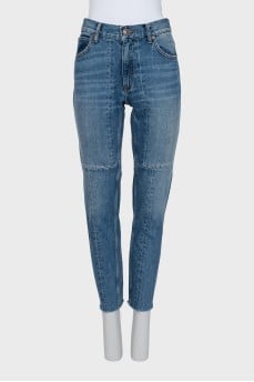 Jeans with raw edges and distressing