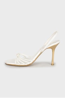 White sandals with golden heels
