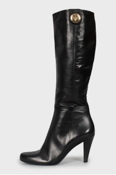 Black leather boots with heels