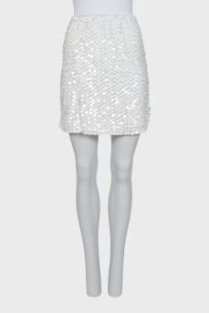 The skirt is decorated with sequins with a tag