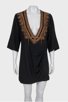 Black dress with bronze decor