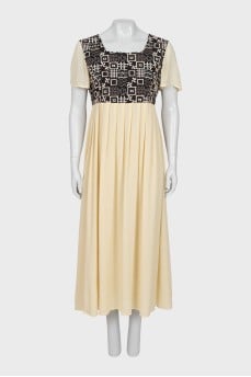 Yellow dress with ornament
