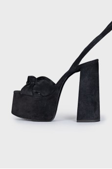 Suede sandals with high soles and heels
