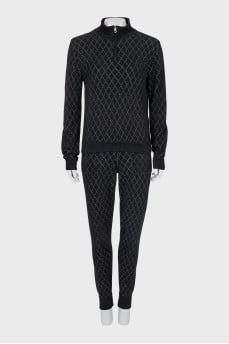 Suit of a cardigan with a zipper and trousers