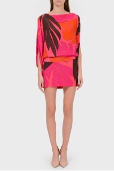 Silk bright dress with a cut on the back
