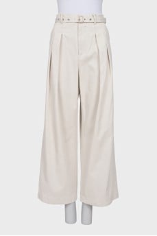 White jeans with belt