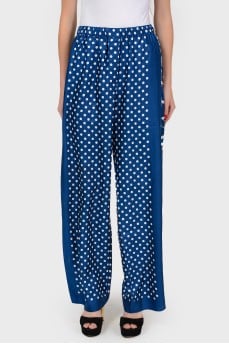 Wide trousers in white polka dots